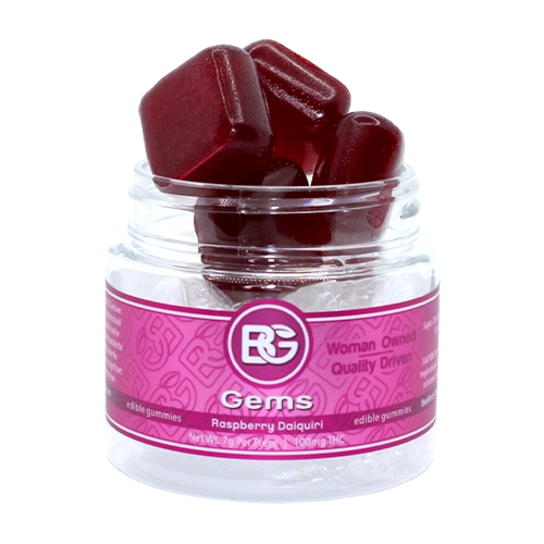 Bedford Grow “Gems” Raspberry Daiquiri cannabis gummies in a clear jar with a pink label, showing several dark red, cube-shaped gummies stacked above the rim.